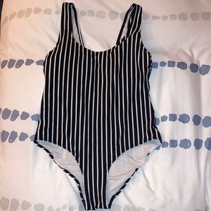 Black and white striped one piece bathing suit